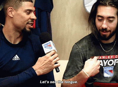 Man In New York Rangers Shirt Talking Into Microphone GIF