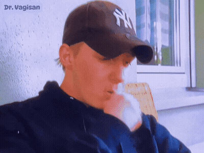 Man In New York Yankees Hat Smoking GIF
