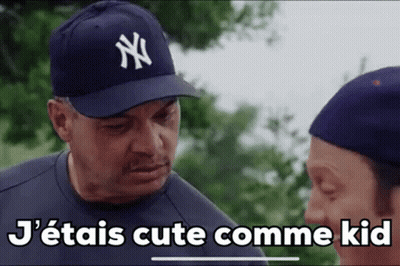 Man In New York Yankees Hat Talking To Another Man GIF