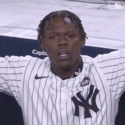 Man In New York Yankees Jersey With Arms Outstretched GIF