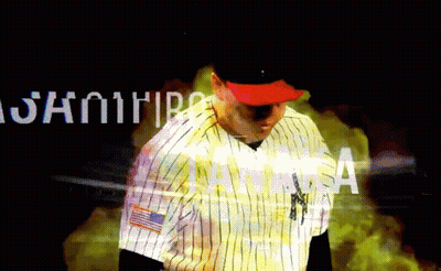 Man In New York Yankees Uniform Standing By Samurai Sign GIF