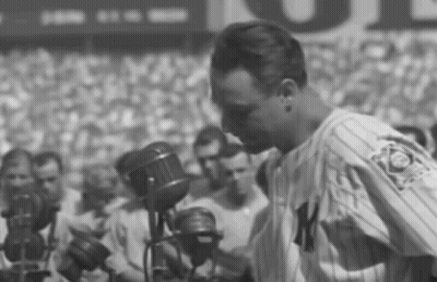 Man In New York Yankees Uniform With Microphone GIF