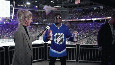 Man In NHL Jersey Interviewed By Reporter GIF