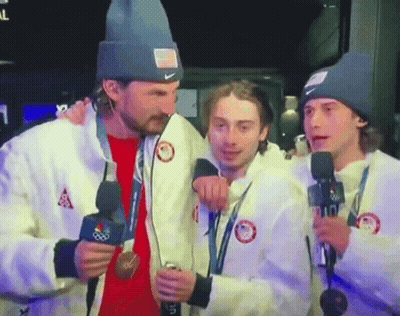 Man In Nike Beanie Talking Into Microphone GIF