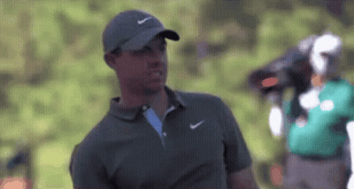 Man In Nike Hat And Polo Shirt On Golf Course GIF