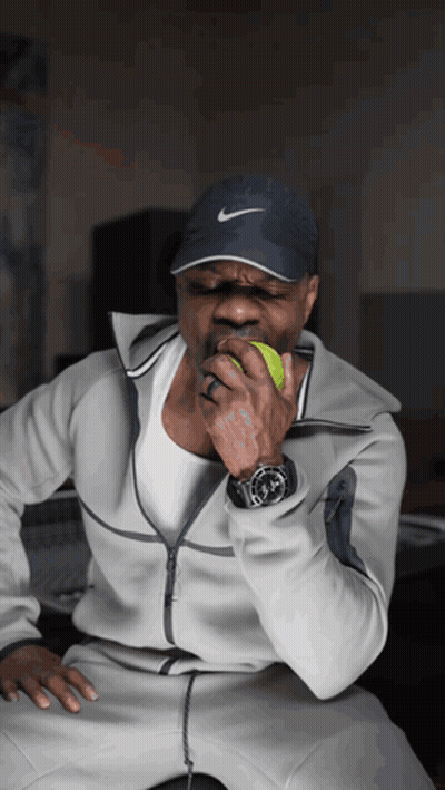 Man In Nike Hat Biting Green Apple GIF