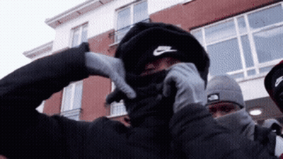 Man In Nike Hat Covering Face GIF