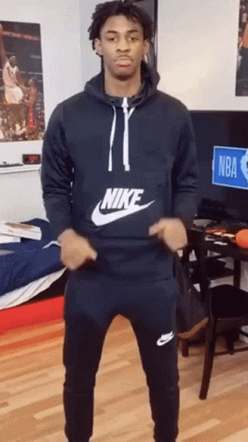 Man In Nike Hoodie And Sweatpants GIF