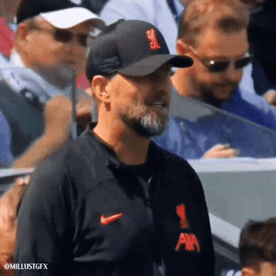 Man In Nike Jacket Watching Soccer Game GIF