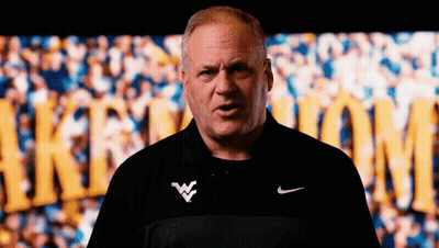 Man In Nike Shirt Standing In Front Of Crowd GIF