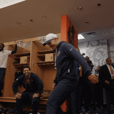 Man In Nike Sweatshirt In Locker Room GIF