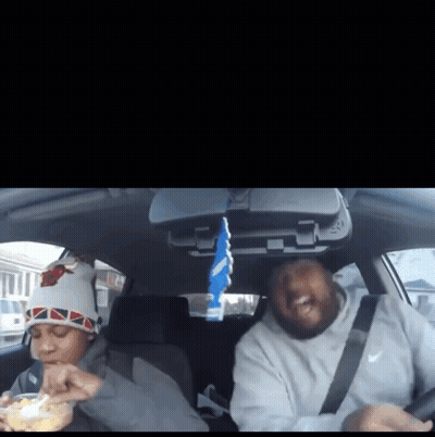 Man In Nike Sweatshirt Sitting In Car With Another Man GIF