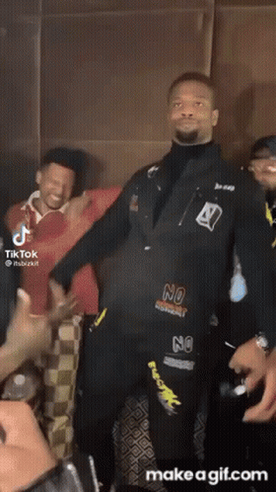 Man In No Movement Jacket Dancing With Others GIF