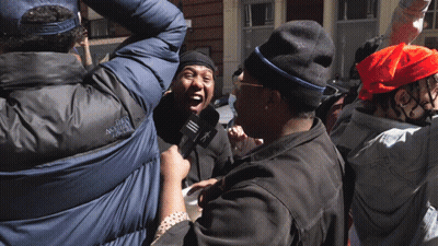 Man In North Face Jacket Interviewed GIF