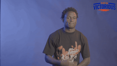 Man In Number 1 Jersey In Front Of Crowd GIF