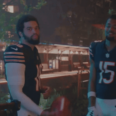 Man In Number 15 Jersey Standing Next To Another Man GIF