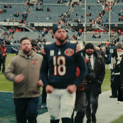 Man In Number 18 Jersey Walking GIF