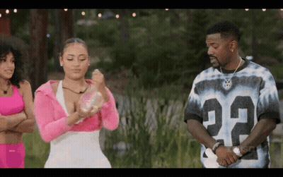 Man In Number 22 Jersey Beside Two Women GIF