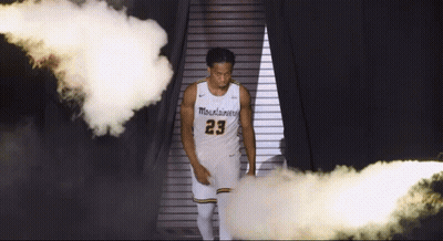 Man In Number 23 Jersey Walking Through Smoke GIF
