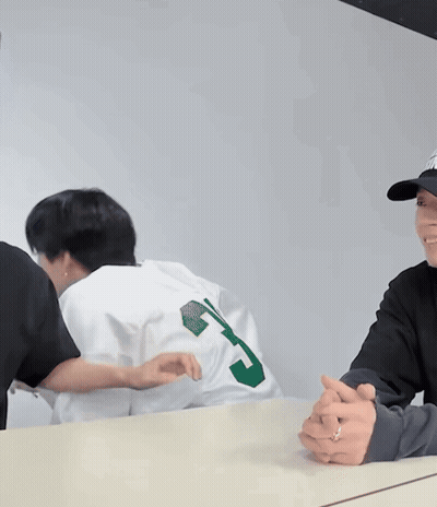Man In Number 24 Jersey High Fiving GIF