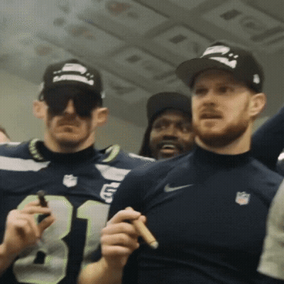 Man In Number 31 Jersey Holding Cigar GIF