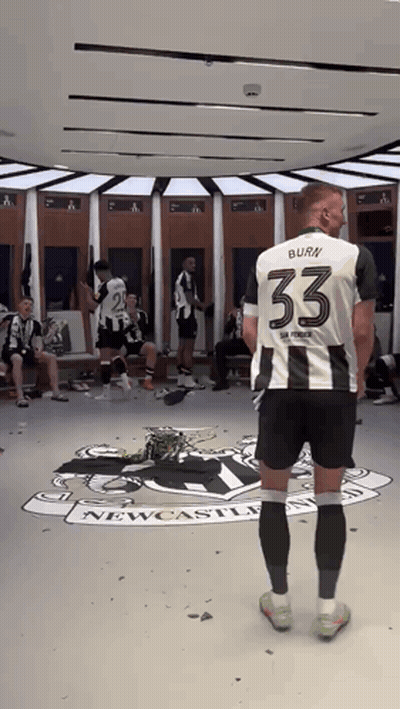 Man In Number 33 Jersey Newcastle Locker Room GIF