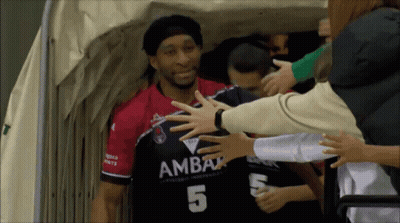 Man In Number 5 Jersey Being Hugged GIF