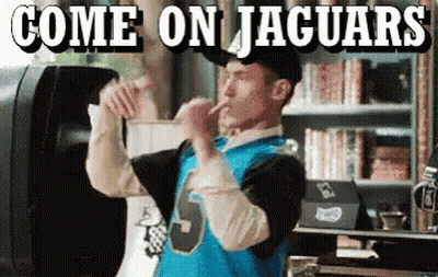 Man In Number 5 Jersey Dancing In Front Of Speaker Saying Come On Jaguars GIF