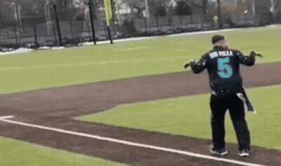 Man in Number 5 Jersey Running on Baseball Field