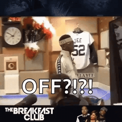 Man In Number 52 Jersey Standing In Front Of Off ? ! ? Sign GIF