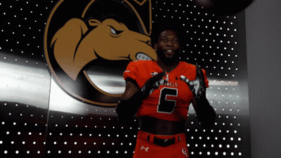 Man In Number 6 Jersey In Front Of Camel Logo GIF