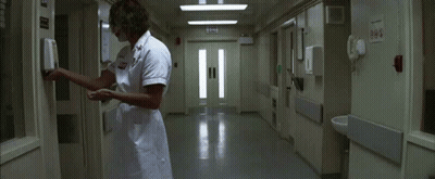 Man In Nurse Uniform With Dent Logo GIF
