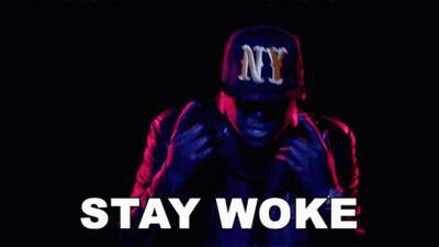 Man In NY Hat And Leather Jacket Saying Stay Woke GIF