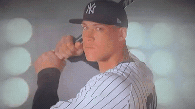 Man In NY Hat Holding Baseball Bat GIF