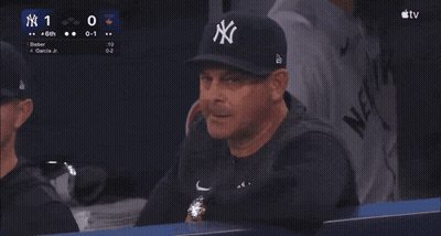 Man In NY Hat Sitting In Dugout At Baseball Game GIF