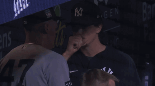 Man In NY Hat Talks To Man In Dugout GIF