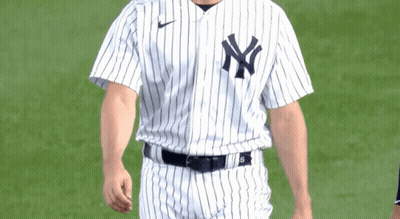 Man In NY Yankees Jersey On Baseball Field GIF