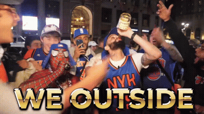 Man in NYK Jersey Holding Beer