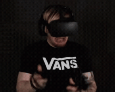 Man In Oculus Headset And Vans Shirt GIF