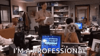 Man in Office Holding Paper