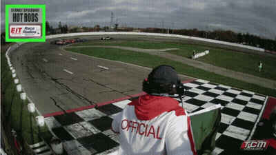 Man In Official Shirt Watching Sydney Speedway Race GIF