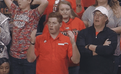 Man In Oklahoma State Shirt In Crowd GIF