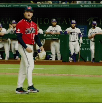 Man In Ole Miss Jersey On Field GIF