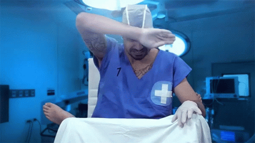 Man In Operating Room With Number 7 GIF
