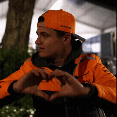 Man In Orange Android Hat Making Heart GIF