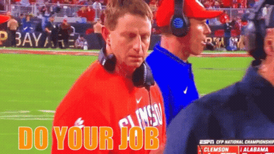 Man In Orange Clemson Shirt On Football Field GIF