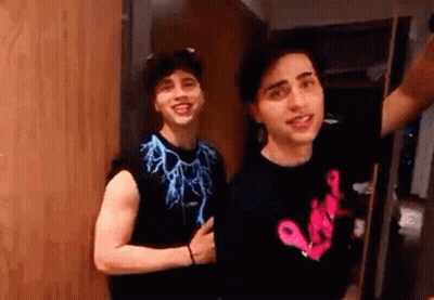 Man In Orange Football Jersey Number 8 Looking GIF