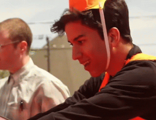 Man In Orange Hat And Orange Vest GIF