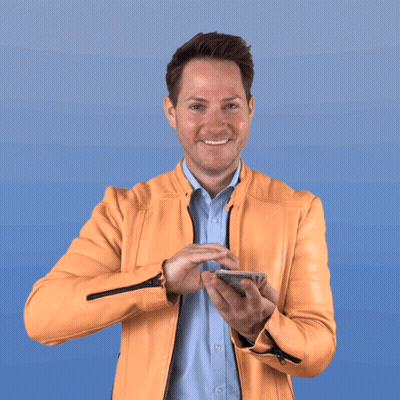 Man In Orange Jacket Holding Dollar Bill GIF