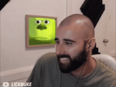 Man in Orange Jacket Talking